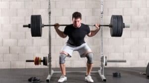 Guy doing squat lift