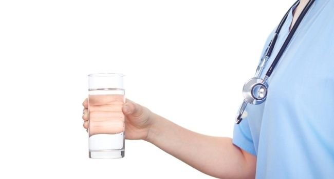 Women holding glass of water